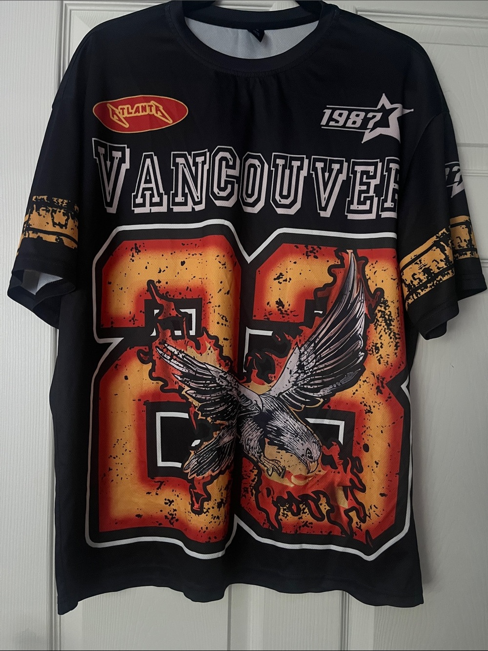 ROMWE Black Graphic Tee with Orange and Yellow Eagle Number Print